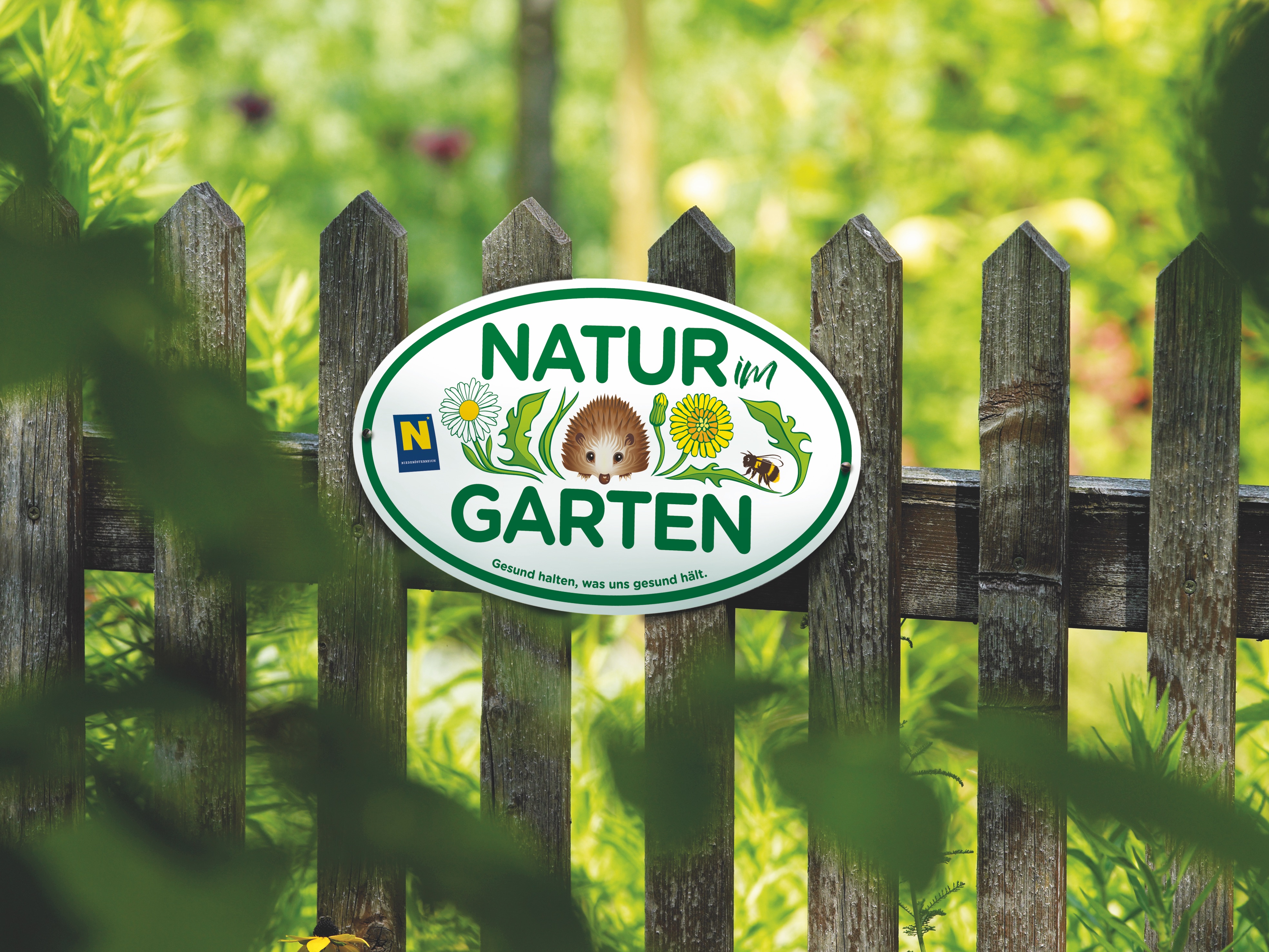 Natur im Garten Plakette am Zaun